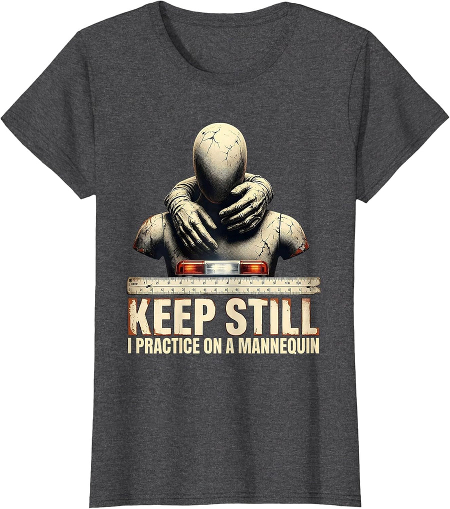 Women's Keep Still I Practice On A Mannequin Funny EMT Paramedic Gag T-Shirt - Dark Heather Grey